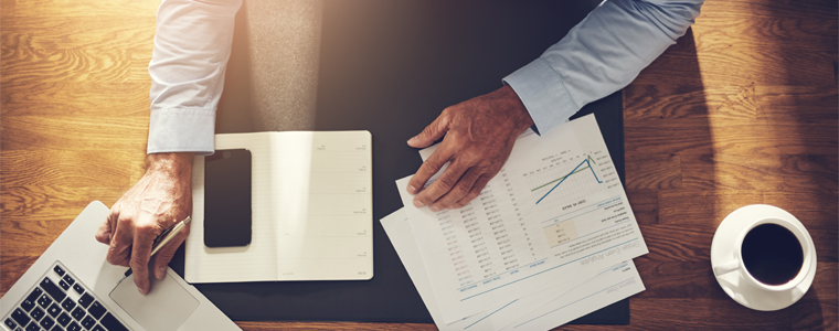 businessman overhead papers