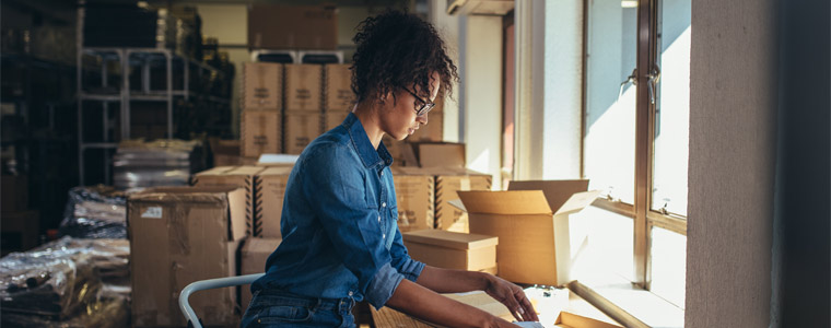 woman packing boxes