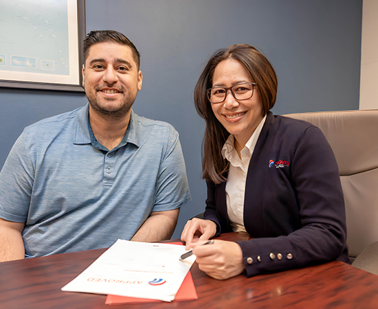 co workers at a table working on an order