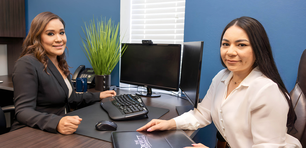 two managers sitting in an office desk